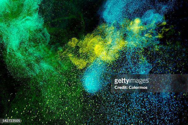 colored powder motion - powder blue imagens e fotografias de stock