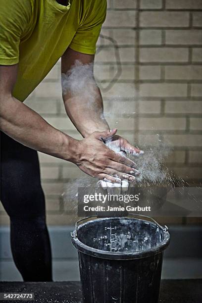 mixed race weight lifter exercising in the gym - sports chalk stock pictures, royalty-free photos & images