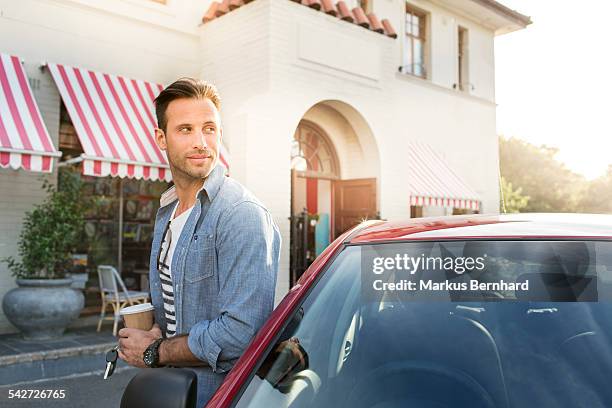 man waiting at cafe. - awning stock pictures, royalty-free photos & images