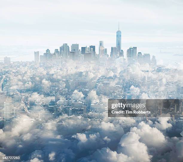 manhattan in the clouds. - a361 stock pictures, royalty-free photos & images