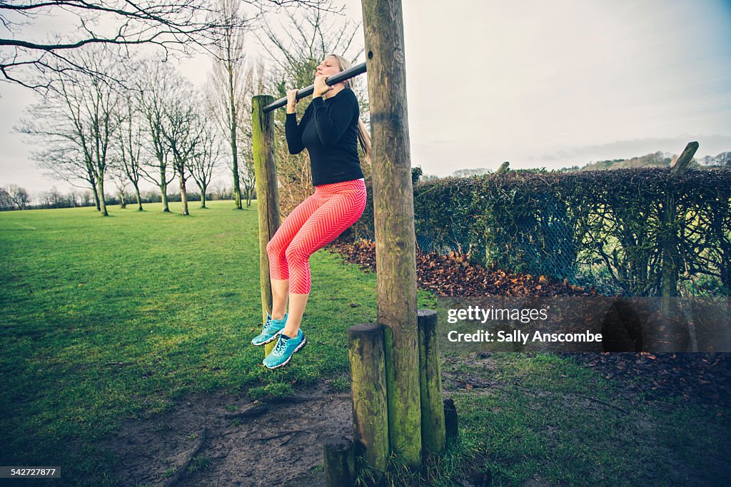 Woman doing a pull up