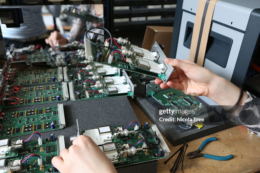 Apd Engineer Female Engineer Working On An Apd Circuit Boards High-Res Stock Photo ...