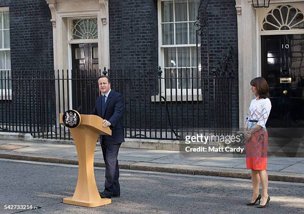 British Prime Minister David Cameron resigns on the steps of 10 Downing Street as his wife Samantha Cameron listens on June 24, 2016 in London,...