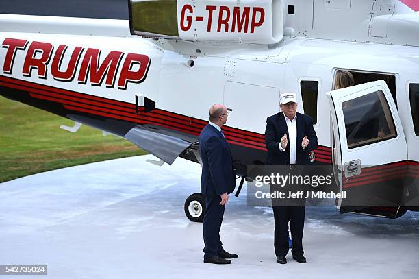 Presumptive Republican nominee for US president Donald Trump arrives by helicopter to his Trump Turnberry Resort on June 24, 2016 in Ayr, Scotland....