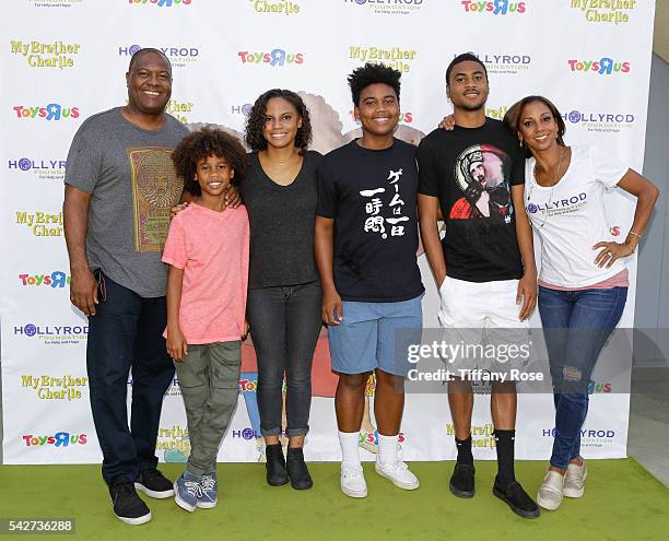 Former NFL Player Rodney Peete and Actress Holly Robinson Peete pose with their children at the HollyRod Foundation's "My Brother Charlie goes to the...