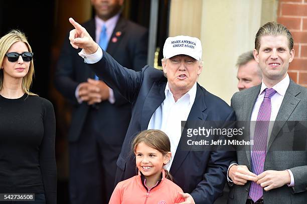 Presumptive Republican nominee for US president Donald Trump surround by his family Eric Trump , Kai Trump and Ivanka Trump arrive to his Trump...