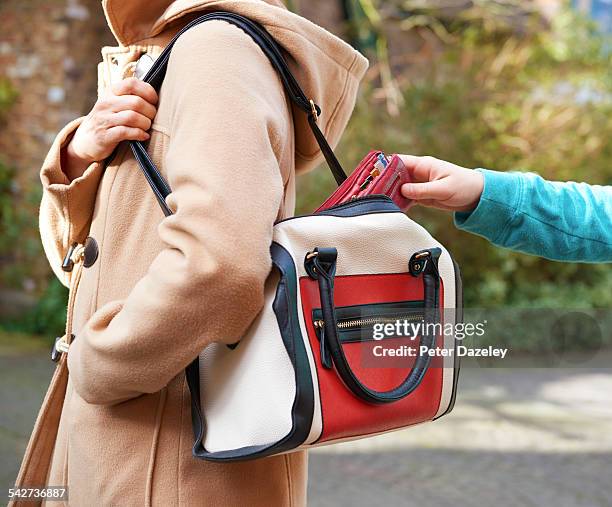 pick pocket taking wallet - beige jacka bildbanksfoton och bilder