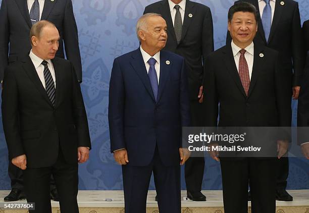 Russian President Vladimir Putin, Uzbek President Islam Karimov and Chinese President Xi Jinping attend the Shanghai Cooperation Organisation Summit...