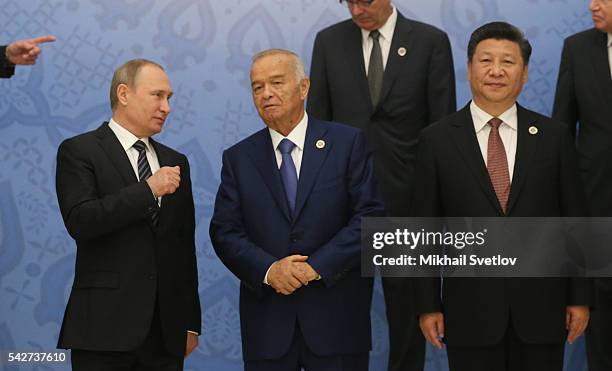 Russian President Vladimir Putin, Uzbek President Islam Karimov and Chinese President Xi Jinping attend the Shanghai Cooperation Organisation Summit...