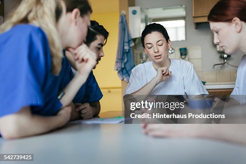 Doctors And Stuff Discussing In Break Room Doctors And Stuff Discussing In Break Room