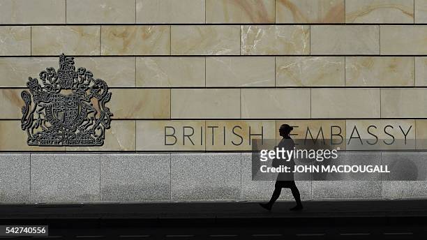Woman passes by the British Embassy on June 24, 2016 in Berlin. Britain voted to leave the European Union in a so-called Brexit referendum on June...