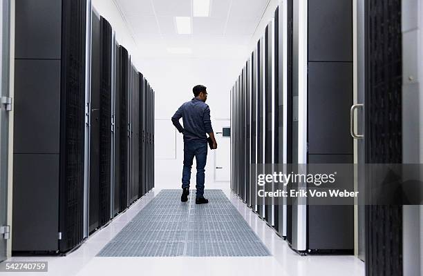 people working in modern server room - network server stock pictures, royalty-free photos & images