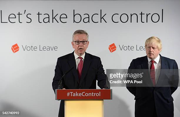Michael Gove MP speaks during a press conference as Boris Johnson MP looks on following the results of the EU referendum at Westminster Tower on June...