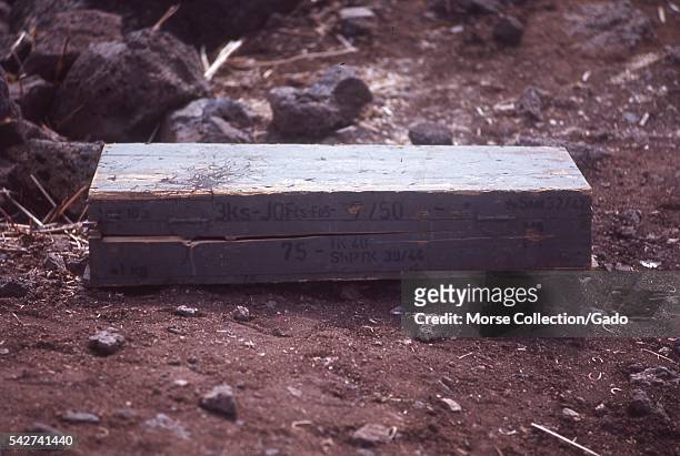 Wooden ordnance box on the ground among remnants of the Six Day War in the Golan Heights, Israel, November, 1967. .
