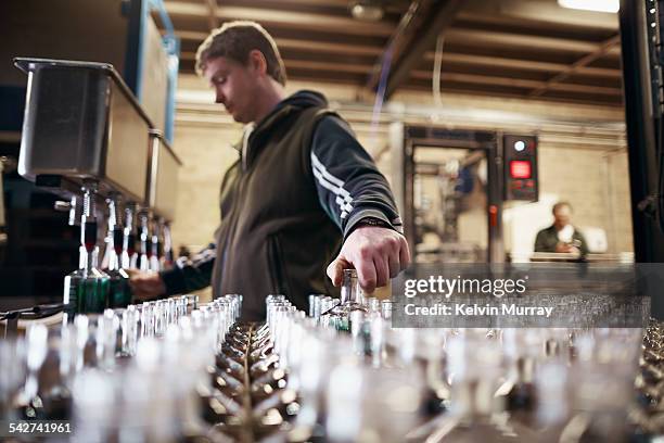 distillery - bottle factory stockfoto's en -beelden