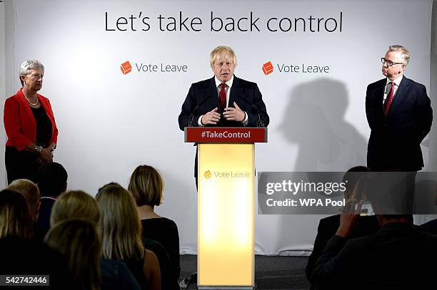 Boris Johnson MP speaks during a press conference as Gisela Stuart and Michael Gove look on following the results of the EU referendum at Westminster...