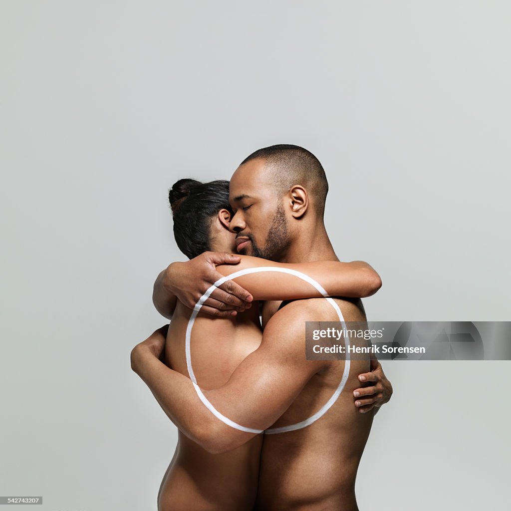 Man and woman embracing each other