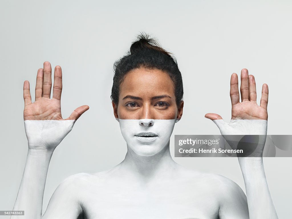 Woman painted white