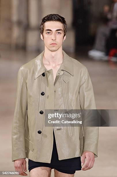 Model walks the runway at the Maison Margiela Spring Summer 2017 fashion show during Paris Menswear Fashion Week on June 24, 2016 in Paris, France.