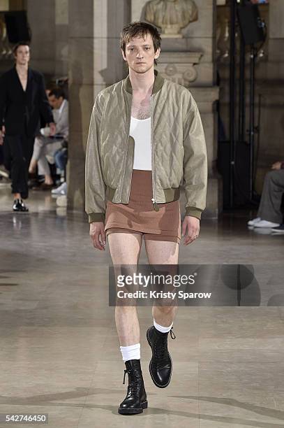 Model walks the runway during the Maison Margiela Menswear Spring/Summer 2017 show as part of Paris Fashion Week on June 24, 2016 in Paris, France.