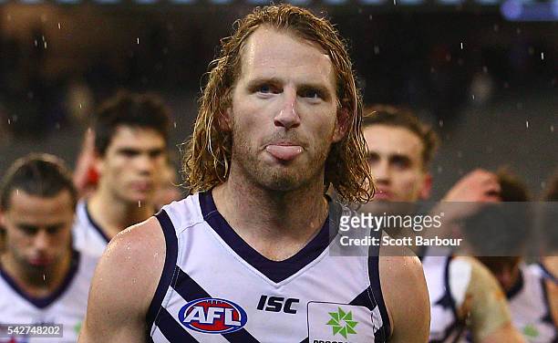David Mundy of the Dockers leads his side from the field after they lost the round 14 AFL match between the Collingwood Magpies and the Fremantle...