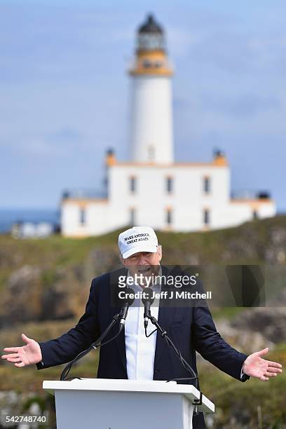 Presumptive Republican nominee for US president Donald Trump gives a press conference on the 9th tee at his Trump Turnberry Resort on June 24, 2016...