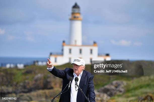 Presumptive Republican nominee for US president Donald Trump gives a press conference on the 9th tee at his Trump Turnberry Resort on June 24, 2016...