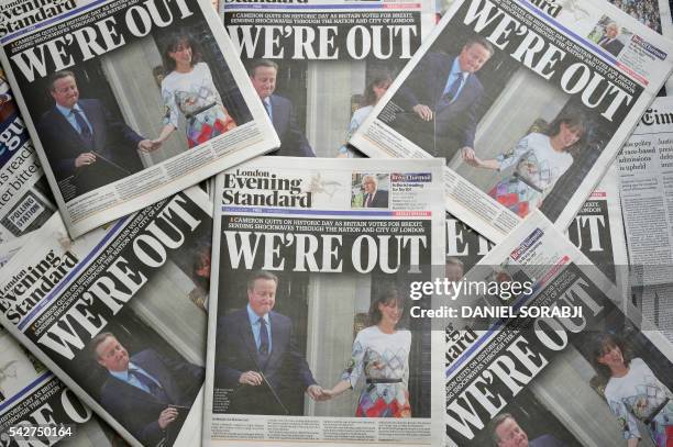 An arrangement of newspapers pictured in London on June 24 as an illustration, shows the front page of the London Evening Standard newpaper reporting...