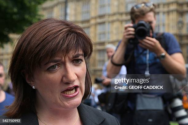 British Education Secretary and Minister for Women and Equalities Nicky Morgan reacts after speaking to members of the media near the Houses of...