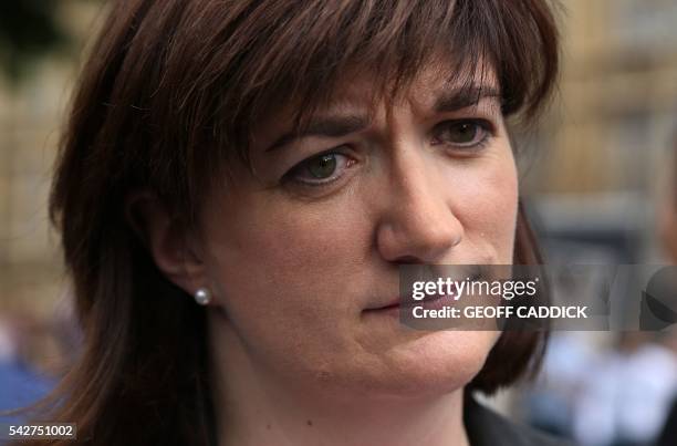 British Education Secretary and Minister for Women and Equalities Nicky Morgan reacts after speaking to members of the media near the Houses of...