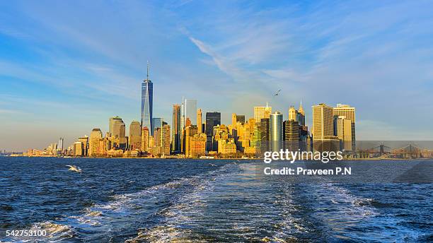 financial district during sunset - nyc ferry stock pictures, royalty-free photos & images