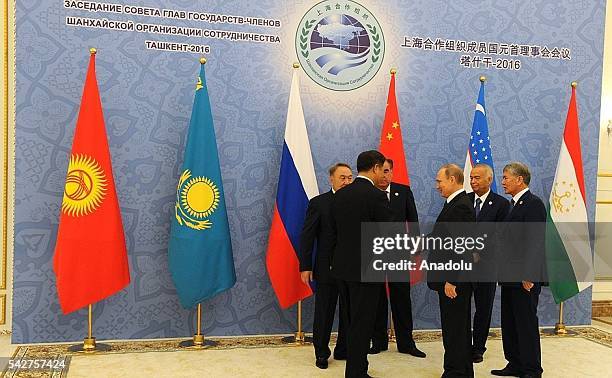 Kyrgyzstan's President Almazbek Atambayev , Kazakhstan's President Nursultan Nazarbayev , Russia's President Vladimir Putin , China's President Xi...