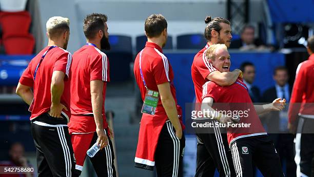 Wales player Gareth Bale and Jonny Williams share a joke during Wales Open Session prior to their Euro 2016 match against Northern Ireland at Parc...