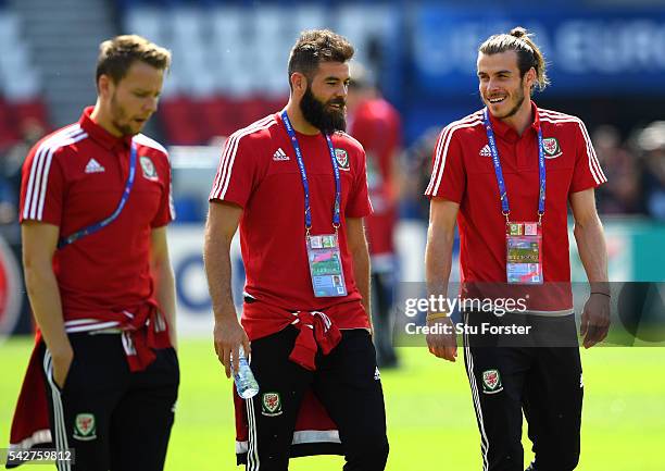 Wales players Joe Ledley Gareth Bale and Chris Gunter share a joke during Wales Open Session prior to their Euro 2016 match against Northern Ireland...