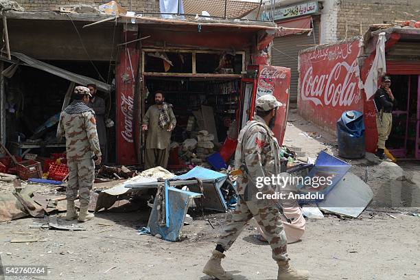 Pakistani security forces examine the area after a bomb blast occurred in Quetta city of Pakistan on June 24, 2016. At least 3 people killed and 28...