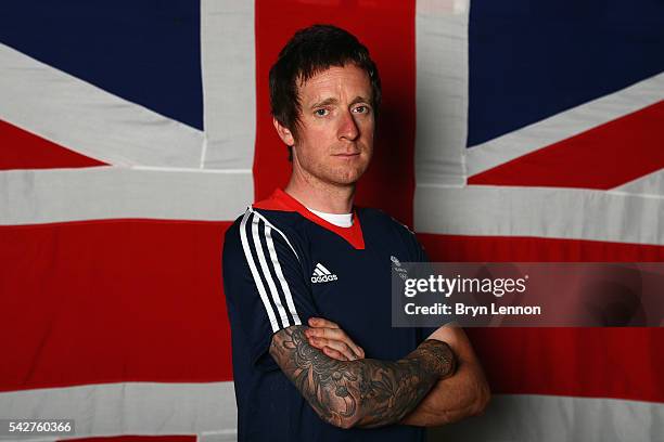 Sir Bradley Wiggins of Team GB poses for a photo at a press conference announcing the Team GB track cyclists selected to ride in the Rio 2016 Olympic...