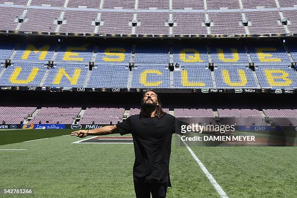 French Disc Jockey Christophe Le Friant aka Bob Sinclar poses on the pitch of the Camp Nou stadium before the French Top14 rugby union final match...