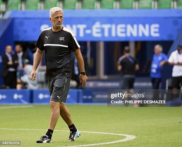 Switzerland's coach Vladimir Petkovic walks over the pitch during a training session at the Geoffroy Guichard stadium in Saint-Etienne, France, on...