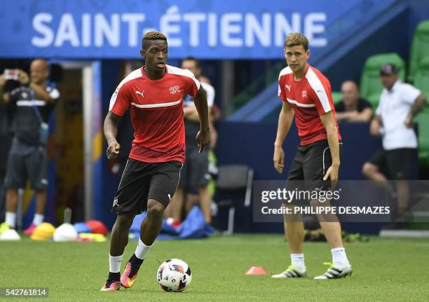 Switzerland's defender Francois Moubandje attends a training session at the Geoffroy Guichard stadium in Saint-Etienne, France, on June 24, 2016 on...