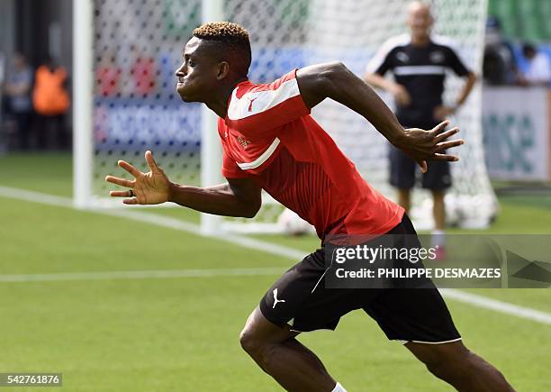 Switzerland's defender Francois Moubandje attends a training session at the Geoffroy Guichard stadium in Saint-Etienne, France, on June 24, 2016 on...