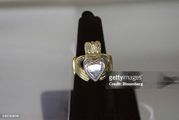 Gold claddagh ring belonging to notorious Boston mobster James "Whitey" Bulger is displayed during a press preview before an asset-forfeiture auction...