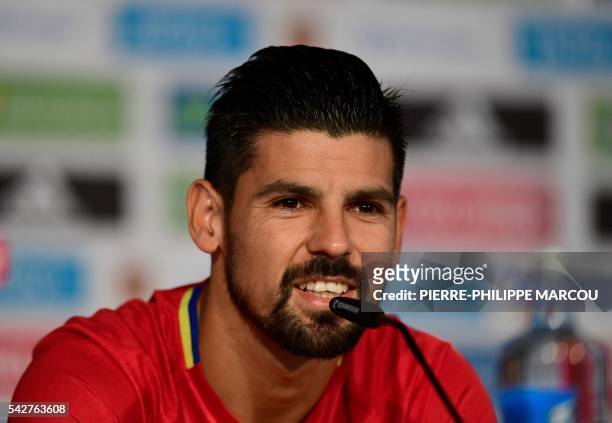 Spain's forward Nolito smiles during a press conference at Saint-Martin-de-Re's stadium on June 24, 2016 during the Euro 2016 football tournament.