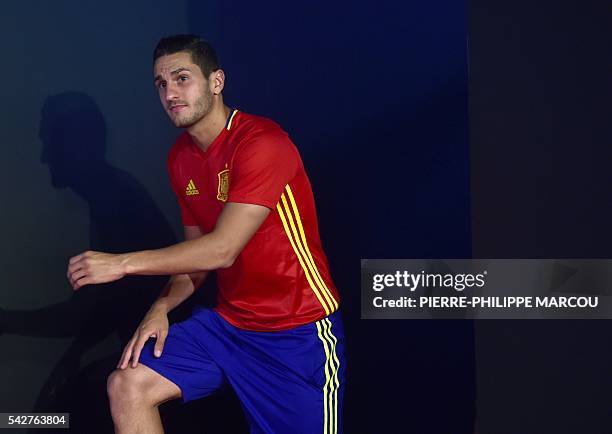 Spain's midfielder Koke arrives for a press conference at Saint-Martin-de-Re's stadium on June 24, 2016 during the Euro 2016 football tournament. /...