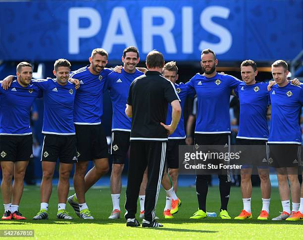 Northern Ireland manager Michael O' Neill addresses his players before Northern Ireland training ahead of their Euro 2016 match against Wales at Parc...