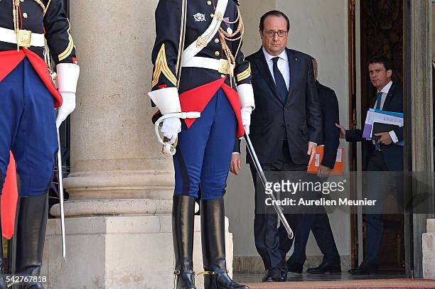 French President Francois Hollande and French Prime Minister Manuel Valls are seen prior to a meeting with French Senate President Gerard Larcher...