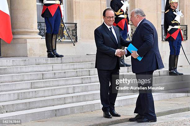 French President Francois Hollande welcomes French Senate President Gerard Larcher for a meeting following the results of the UK EU Referendum vote...