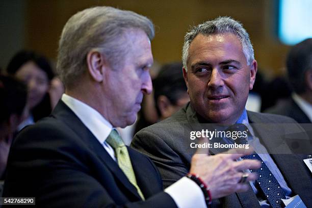 Joe Hockey, former treasurer of Australia and Australias ambassador to the U.S., right, talks to William Cohen, chairman and chief executive officer...