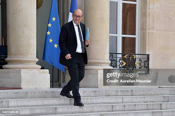 French Minister of Defense Jean-Yves Le Drian leaves after an exceptional cabinet meeting following the results of the UK EU Referendum vote at the...