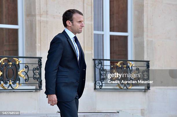 French Minister of Economy, Emmanuel Macron leaves after an exceptional cabinet meeting following the results of the UK EU Referendum vote at the...