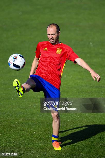 Andres Iniesta of Spain juggles the ball during a training session at Complexe Sportif Marcel Gaillard on June 24, 2016 in La Rochelle, France.